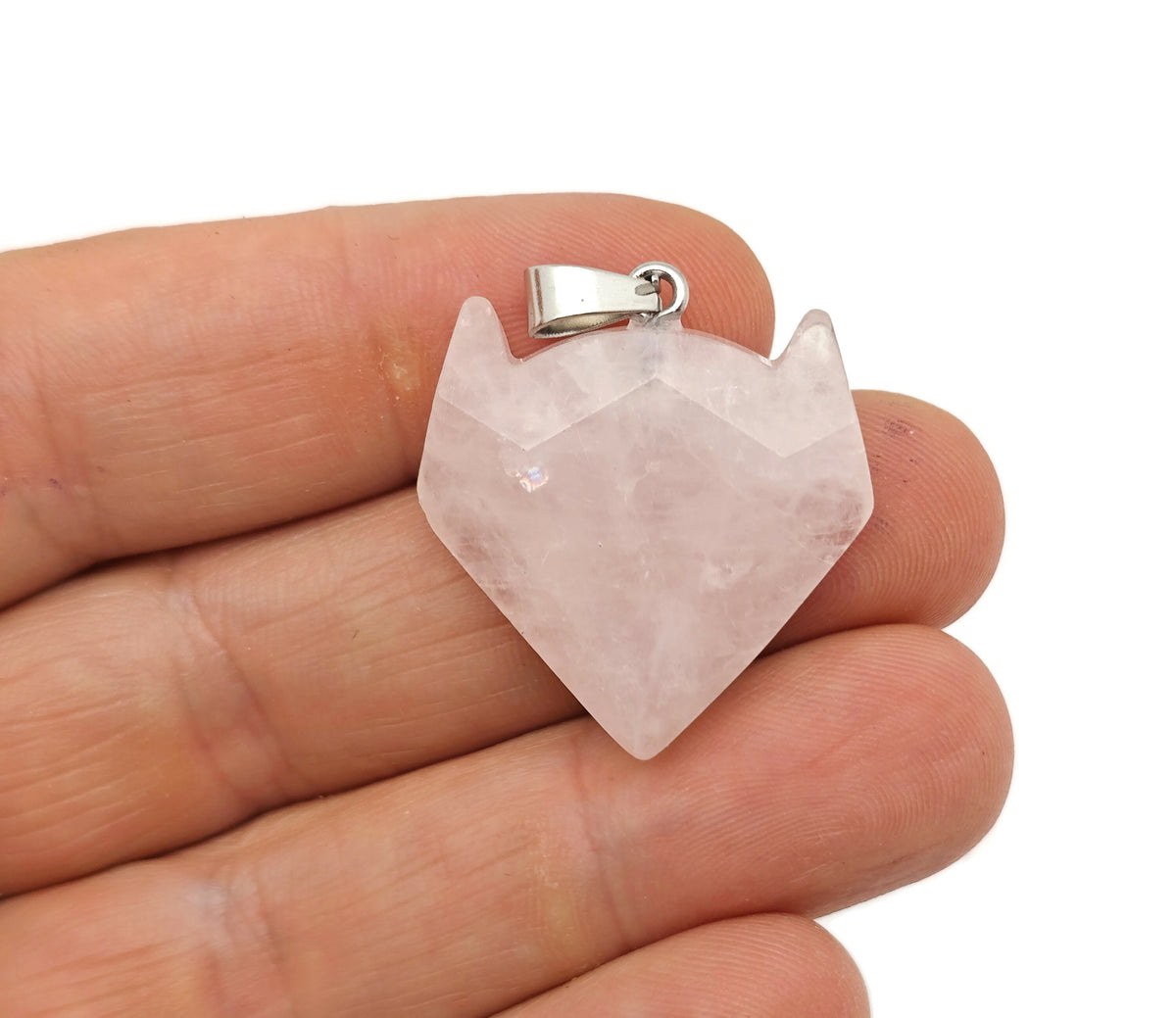 Crystal wolf head gemstone pendant from GemstoneGO featuring a detailed wolf head design in shimmering crystal jewelry.