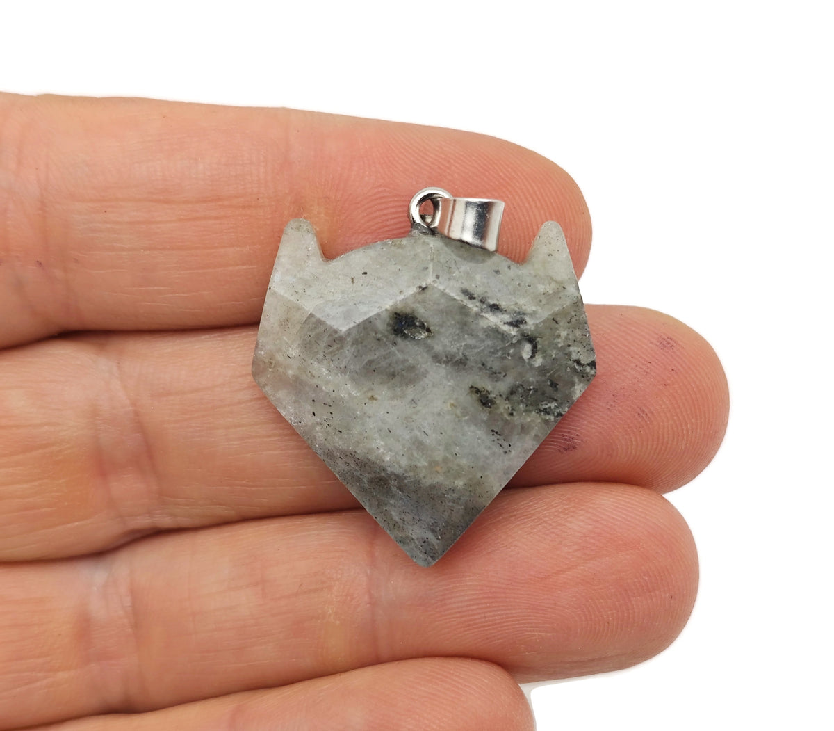 Crystal wolf head gemstone pendant featuring a detailed wolf design, jewelry piece from GemstoneGO with vibrant gemstone details.