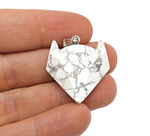 Crystal gemstone wolf head pendant from GemstoneGO, detailed wolf design with shimmering crystal accents in jewelry style.