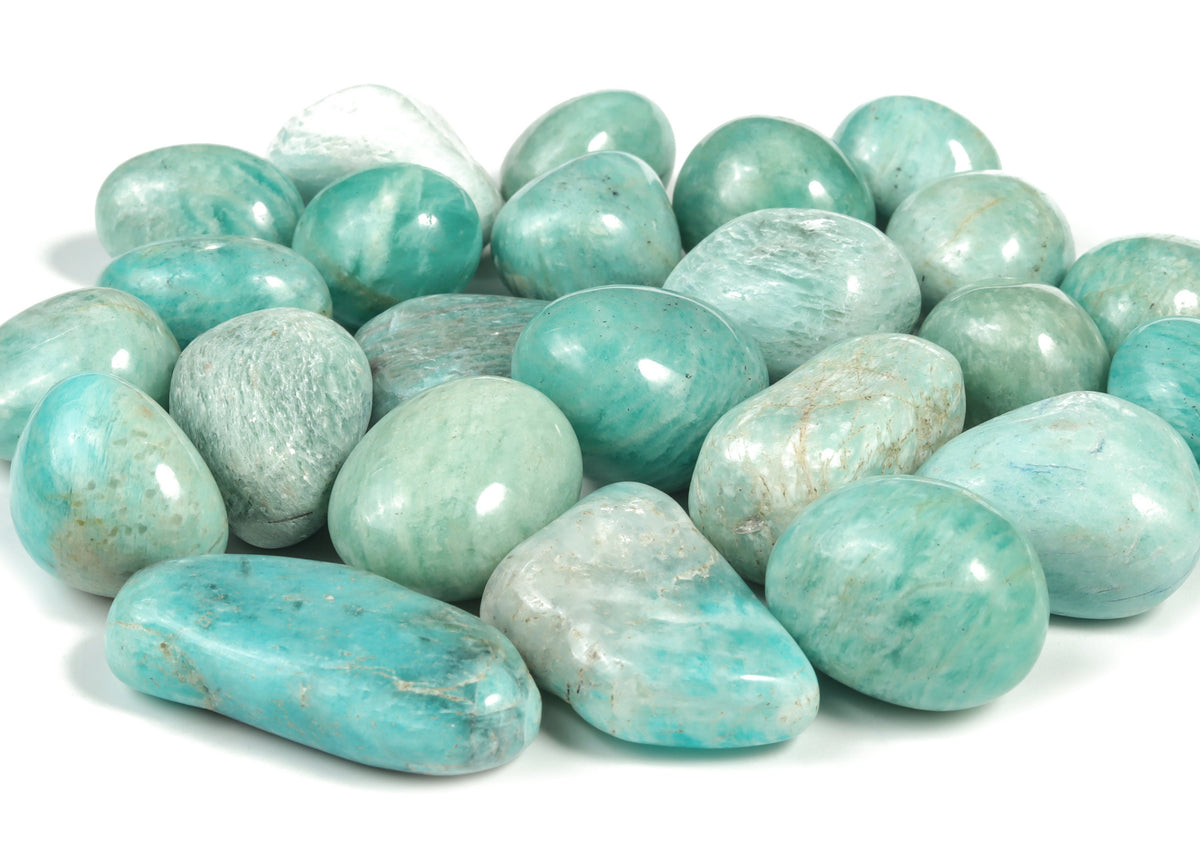 Polished Amazonite tumbled stone from GemstoneGO, smooth blue-green mineral with natural veining, on a neutral background.