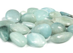 Polished aquamarine tumbled stone from GemstoneGO, smooth blue gemstone with natural variations, ideal for jewelry or healing uses.