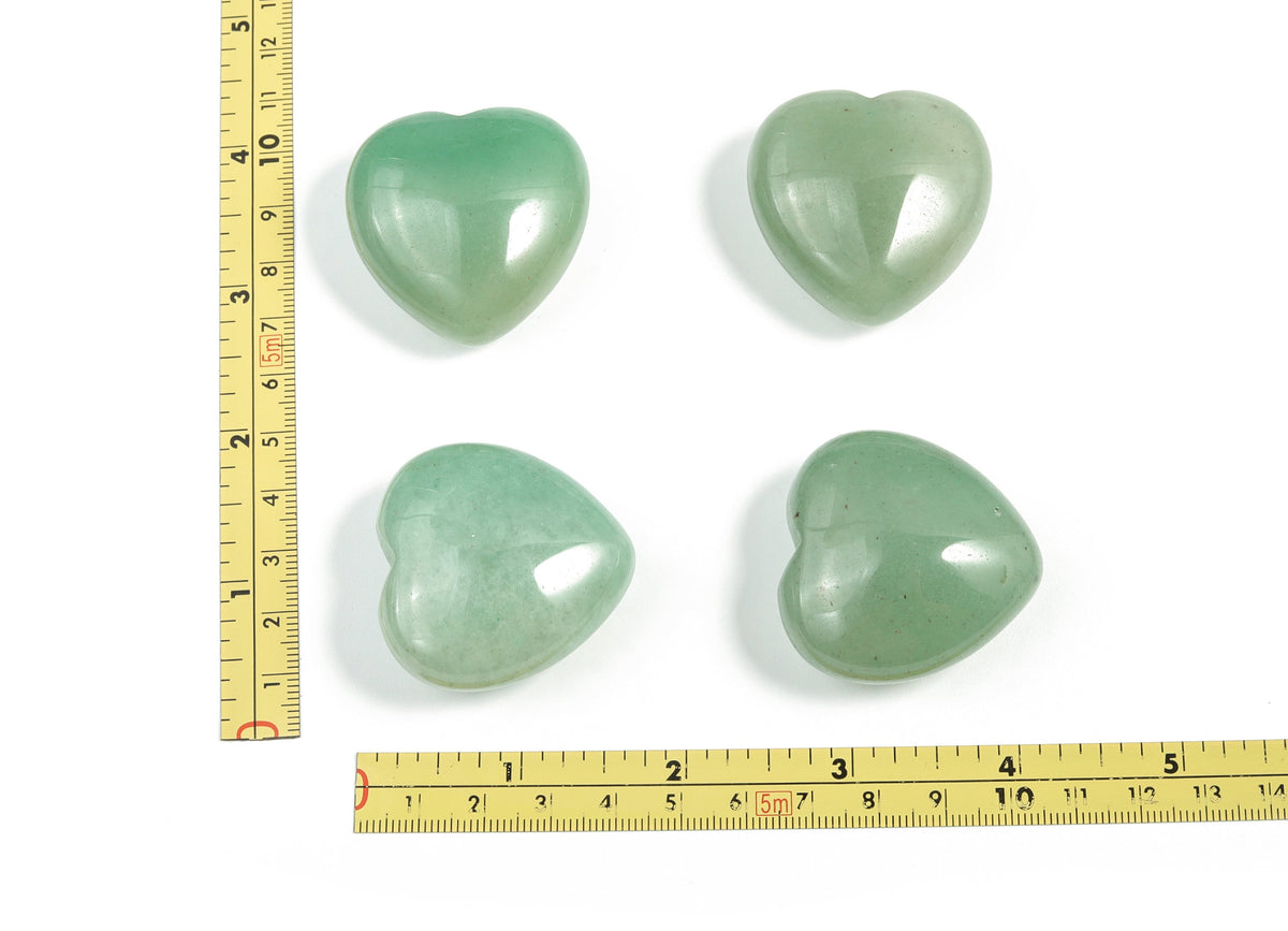 A 40mm Aventurine heart-shaped gemstone from GemstoneGO, showcasing its smooth, polished green mineral surface.