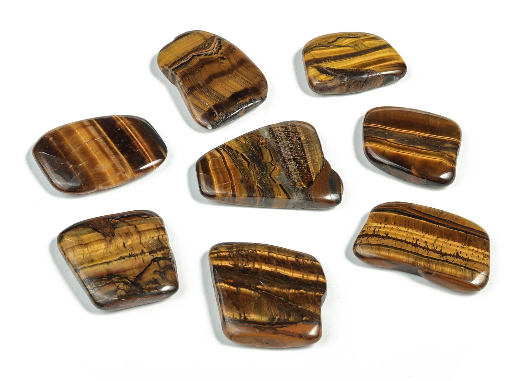 Tiger Eye flat gemstone slab crystal from GemstoneGO showcasing the polished, golden-brown stone with distinctive chatoyancy.