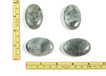 Labradorite palm gemstone spa stone, 45x35mm, smooth polished natural healing stone with iridescent labradorite glow.