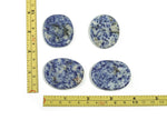 Blue Spot Jasper flat gemstone slab from GemstoneGO, showcasing vibrant blue and black spot patterns on a smooth crystal surface.