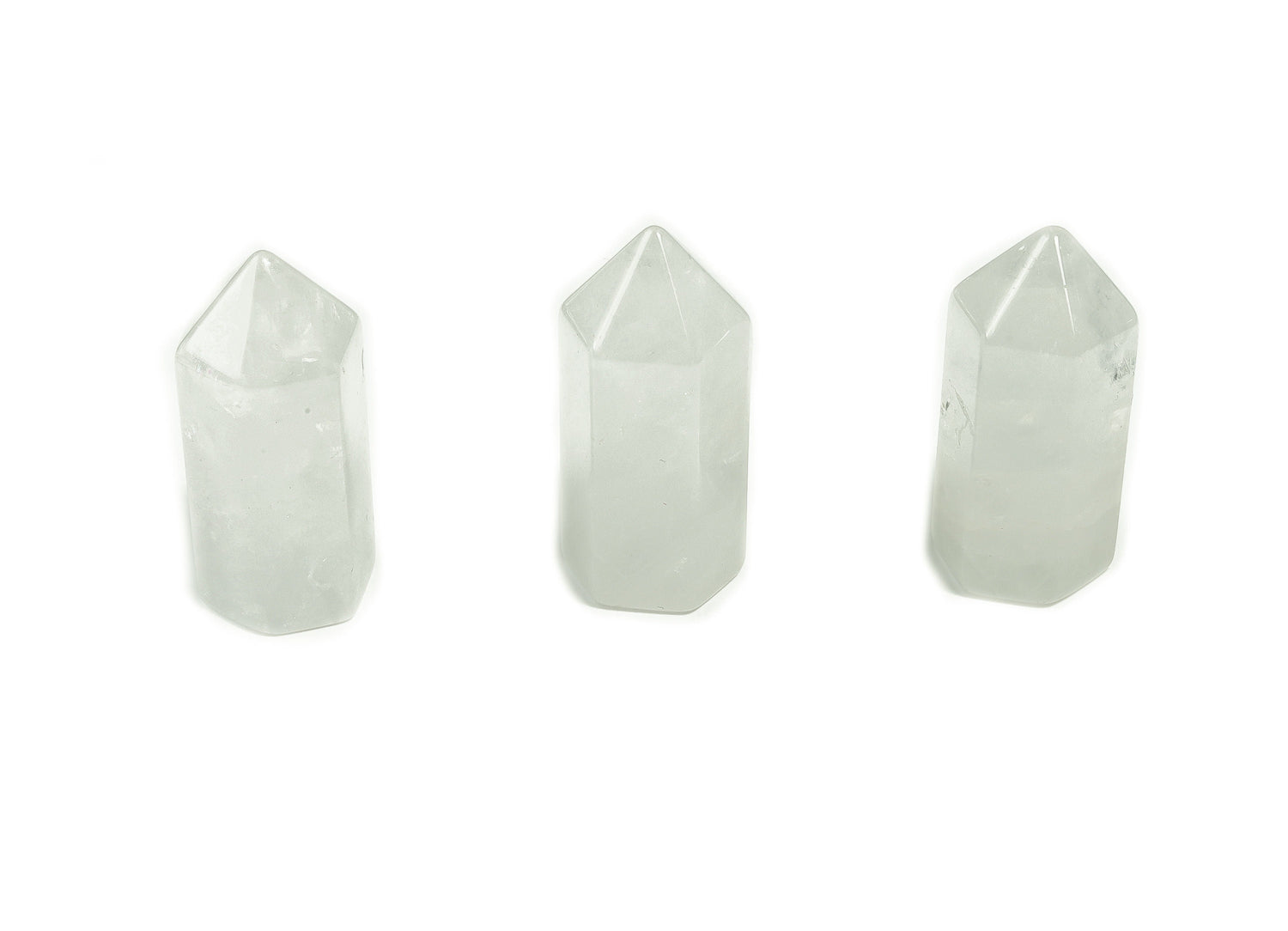 Clear Quartz obelisk tower crystal from GemstoneGO, 35mm tall, with natural clarity and smooth faceted design.