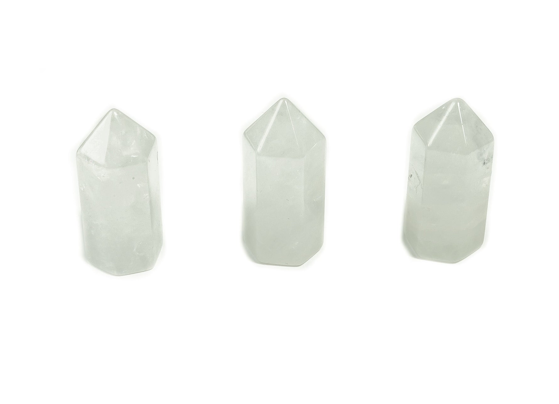 Clear Quartz obelisk tower crystal from GemstoneGO, 35mm tall, with natural clarity and smooth faceted design.