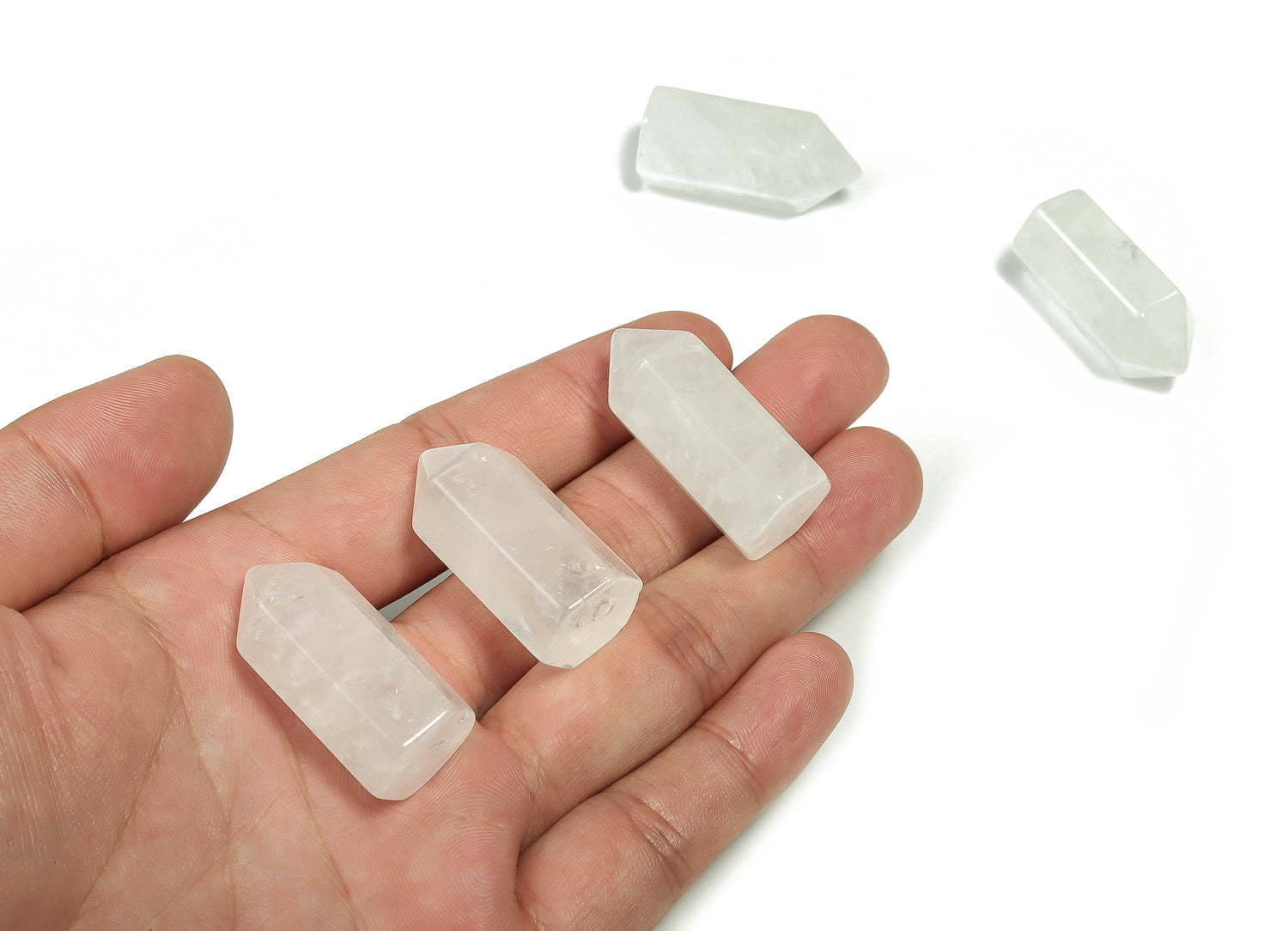 Clear Quartz obelisk tower crystal from GemstoneGO, 35mm, showing a polished, transparent gemstone with natural crystal formations.