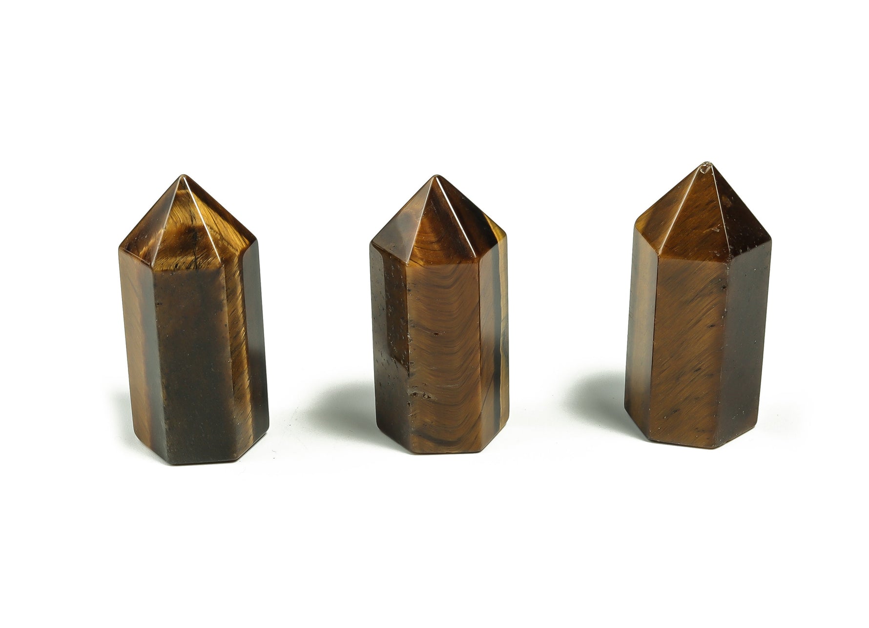 Tiger Eye obelisk tower crystal, 35mm, by GemstoneGO, with polished surface showcasing rich golden-brown bands and natural stone patterns.