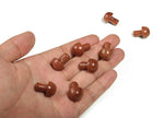 Goldstone mushroom carved gemstone pendant, 20mm, from GemstoneGO, showcasing a smooth, rounded shape with intricate mushroom carving details.