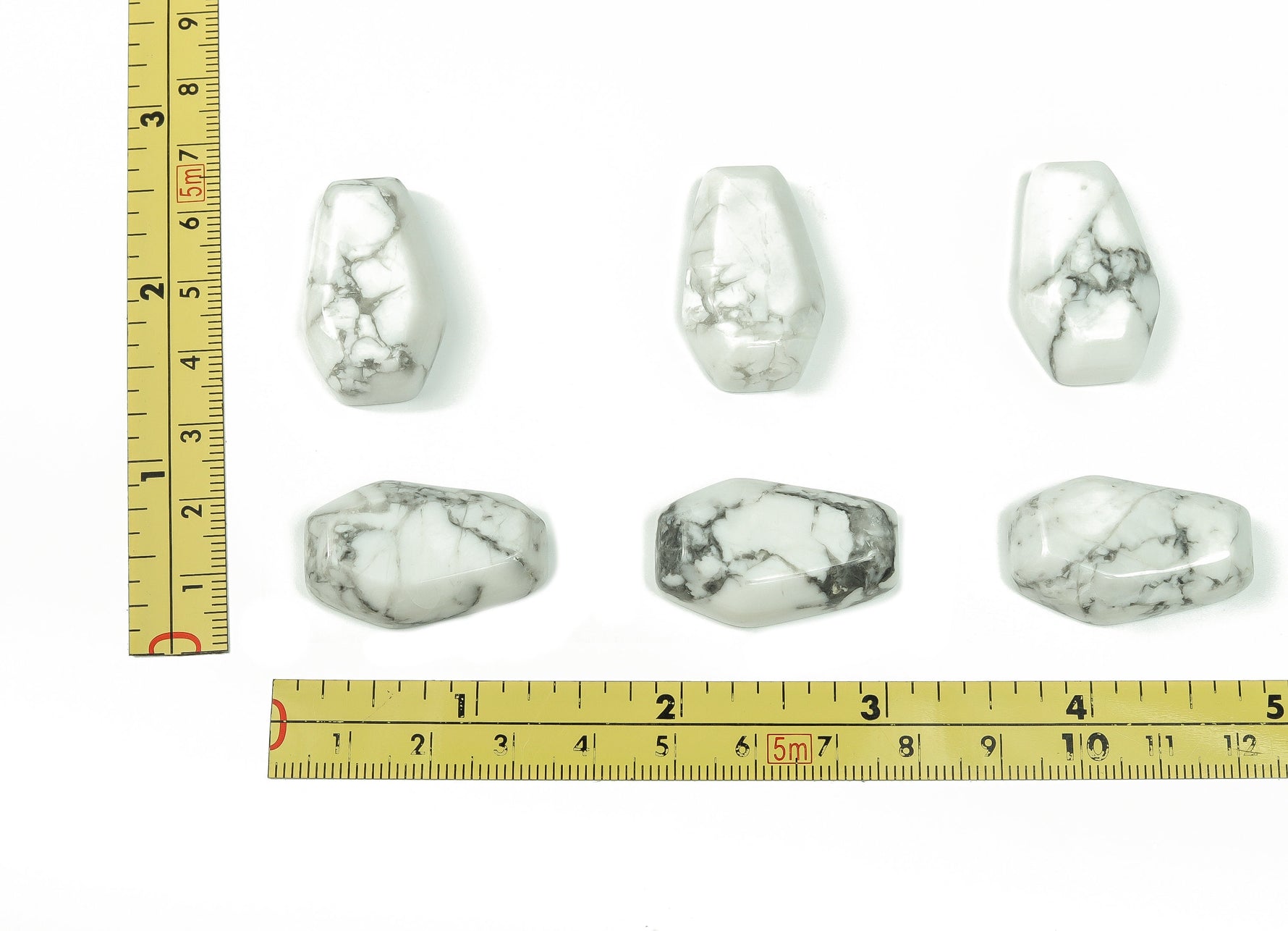 Howlite coffin-shaped crystal cabochon, 30mm gemstone carving by GemstoneGO, showcasing smooth white stone with gray veining.