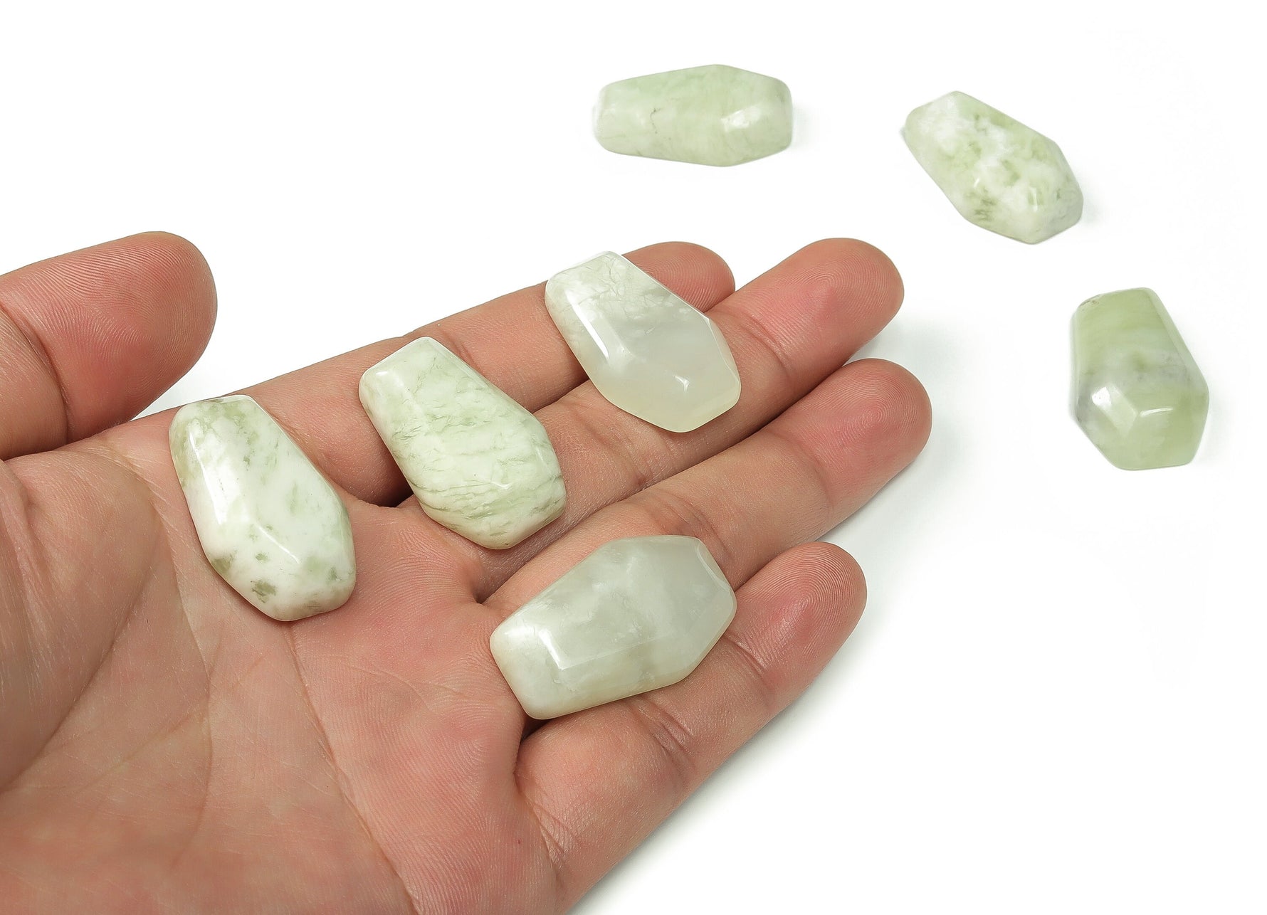 30mm Jade Coffin Crystal Cabochon with detailed carving from GemstoneGO, showcasing a smooth, polished jade gemstone.