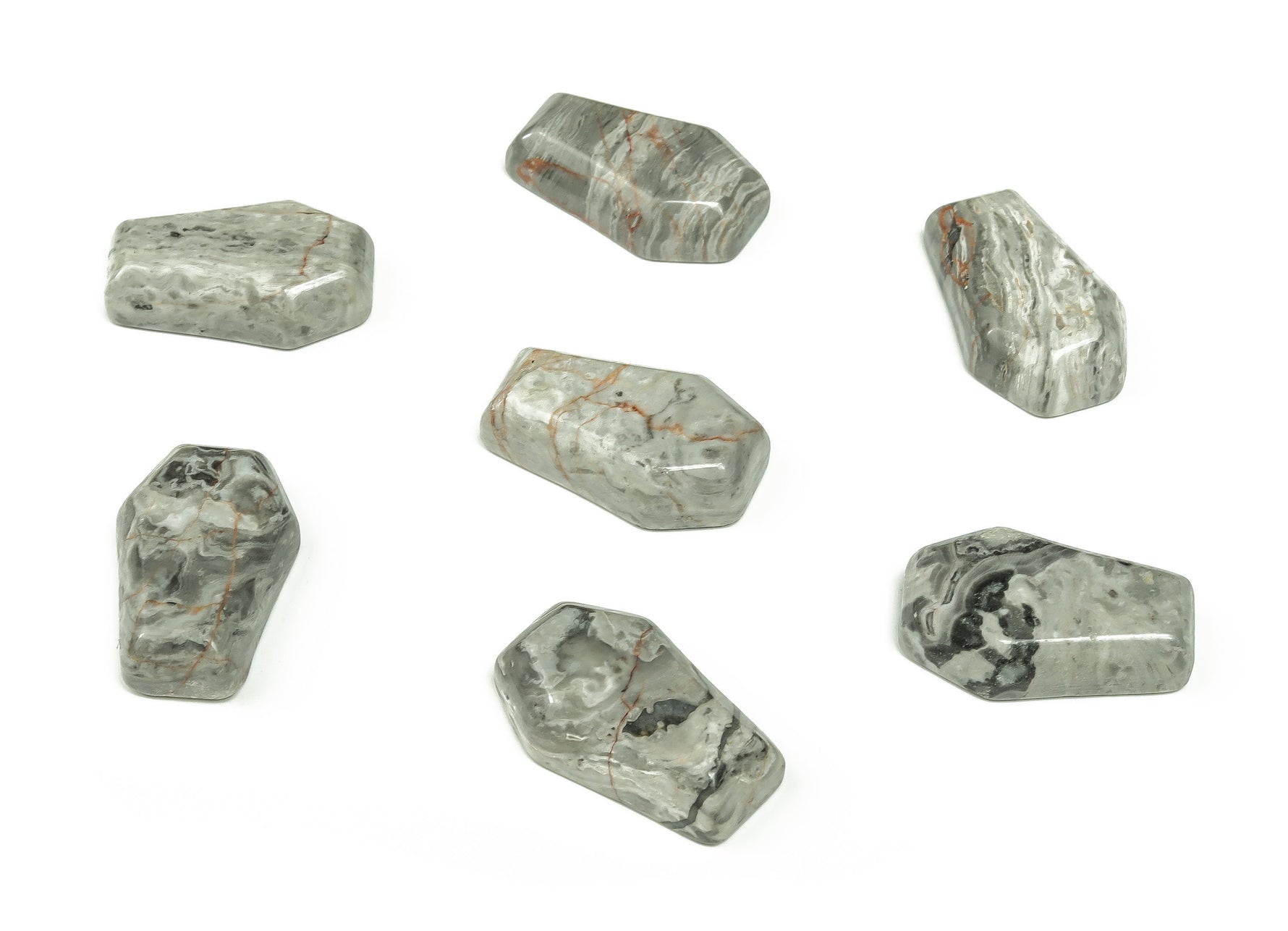 Pink Picasso Jasper coffin-shaped crystal cabochon, 30mm, showcasing intricate carving and vibrant gemstone details.