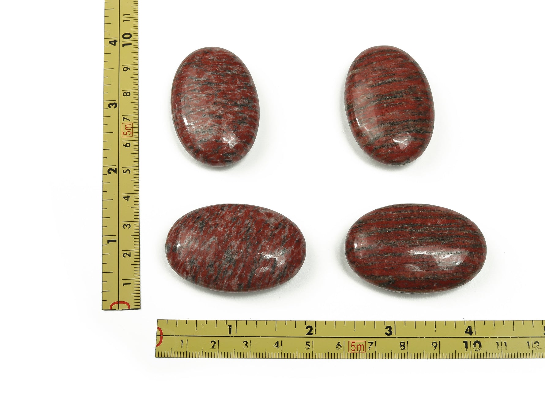 Red sesame jasper palm gemstone spa stone, 45x35mm, polished smooth red and brown gemstone, used for massage and relaxation.