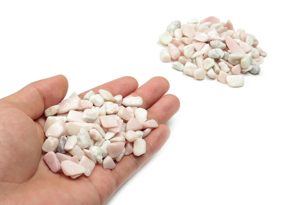 Pink Opal crystal chips, semi-tumbled 7-12mm gemstones in bulk from GemstoneGO, shown in a close-up image.