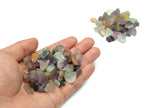 Semi tumbled fluorite crystal chips from GemstoneGO, 7-12mm bulk stones with vibrant green and purple hues, perfect for jewelry or crafts.