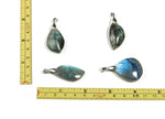 Labradorite crystal pendant from GemstoneGO, featuring a polished, iridescent gemstone ready for jewelry making.