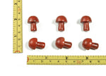 Red Jasper mushroom carved gemstone, 20mm, from GemstoneGO, showing a detailed red mushroom shape with smooth polished surface.