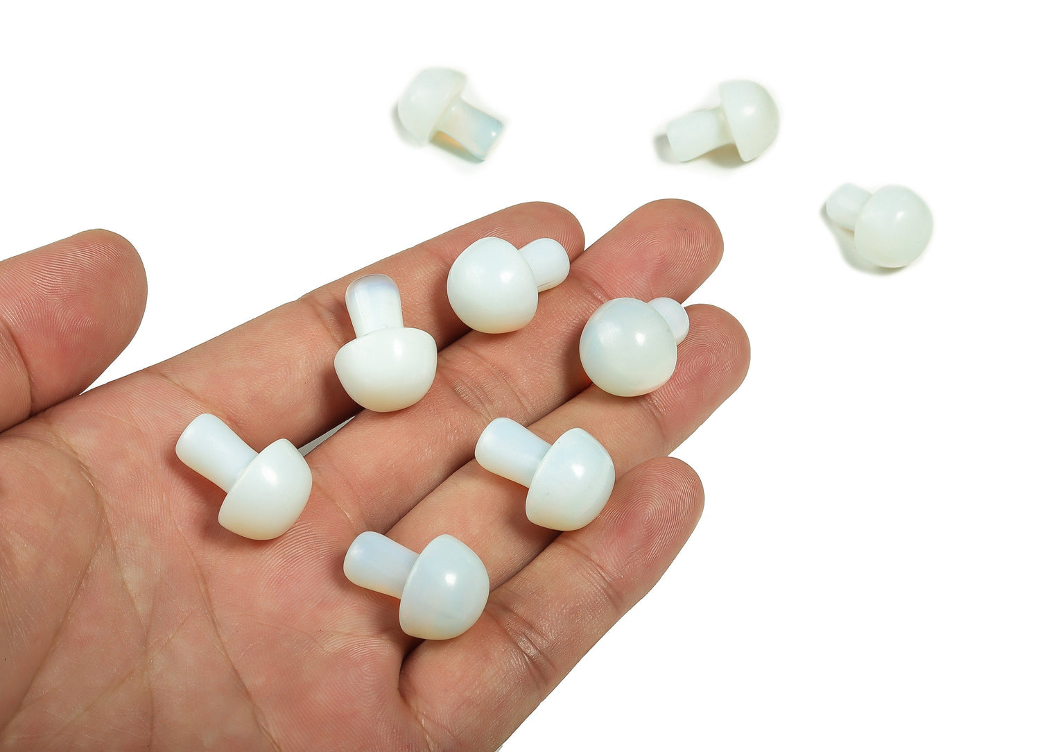 Opalite mushroom carved gemstone, 20mm, showcasing a smooth, polished finish with natural gemstone patterns and a mushroom shape.