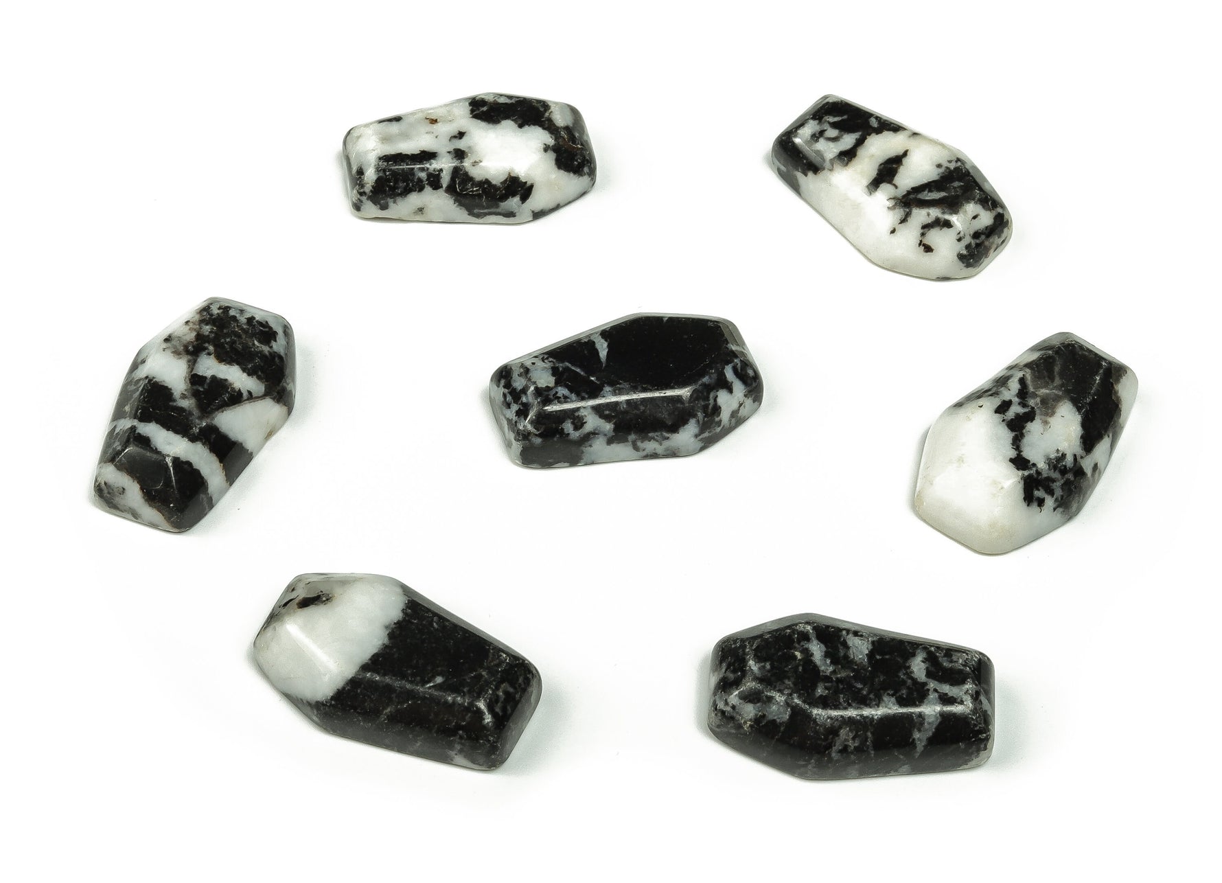 Zebra Calcite coffin-shaped crystal cabochon with carved details, 30mm, from GemstoneGO, showcasing black and white striped patterns.
