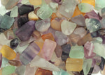 Semi-tumbled fluorite crystal chips in various shades, 7-12mm, natural gemstone pieces from GemstoneGO for jewelry or crafts.