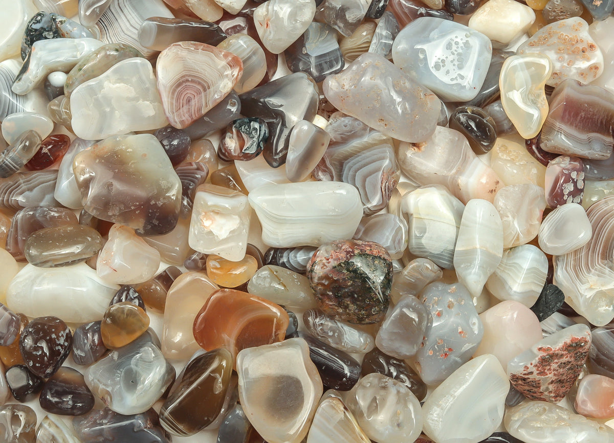 Botswana Agate crystal chips in semi-tumbled 7-12mm size, natural gemstone beads from GemstoneGO, shown in a close-up image.