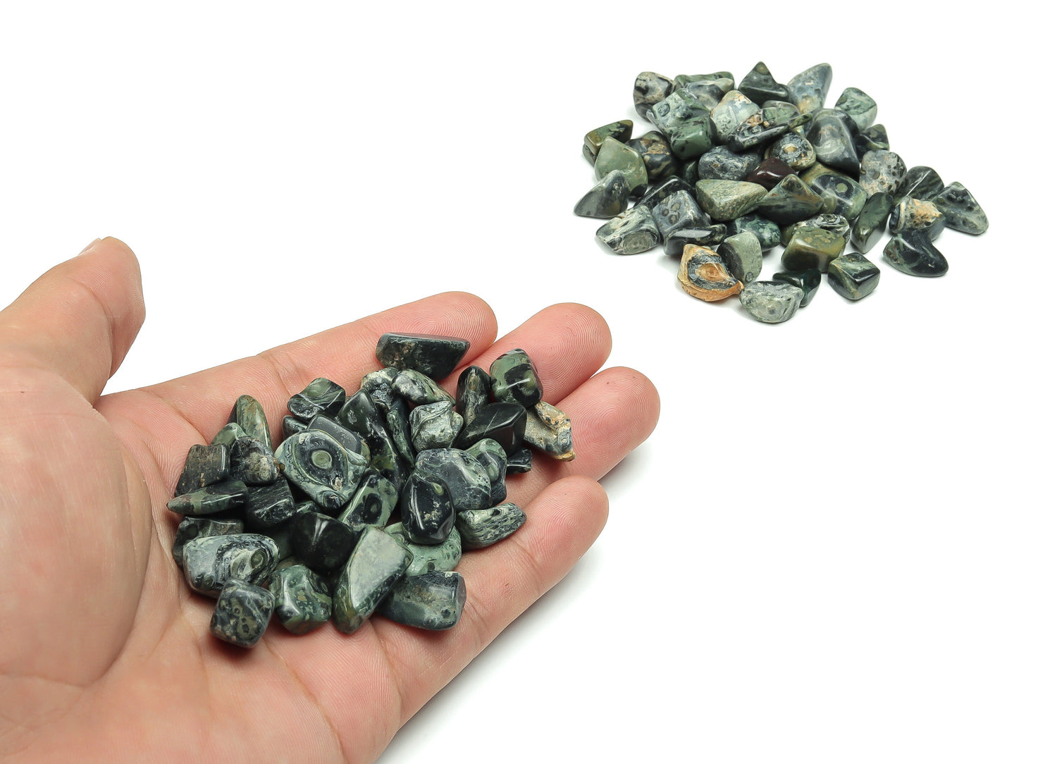 Kambaba Jasper crystal chips in 7-12mm semi-tumbled stones, bulk gemstone from GemstoneGO, showcasing green and black swirling patterns.