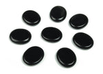 Obsidian flat gemstone slab from GemstoneGO, showcasing smooth black crystal with natural textures, measuring 30x25x7 cm.