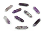 Amethyst terminated carved point gemstone pendant, 33mm, showcasing purple crystal with detailed carvings and pointed tip.