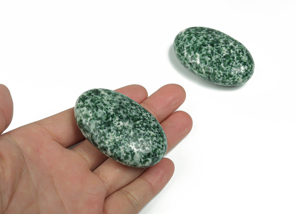 Green jade palm spa stone from GemstoneGO, 60x40mm Qinghai jade gemstone with smooth, polished surface for massage and relaxation.
