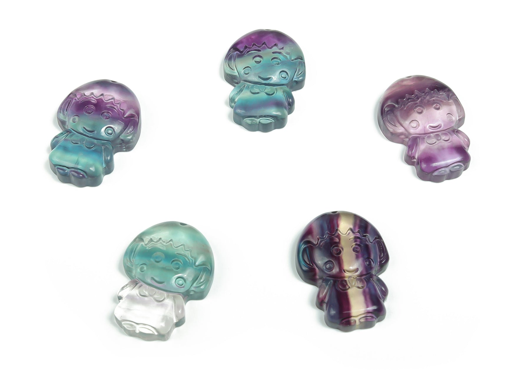 Fluorite girl kid gemstone carving by GemstoneGO, detailed colorful figurine with vibrant purple and green hues on a white background.