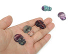 Fluorite girl kid carving gemstone by GemstoneGO showing detailed carved figure in vibrant green and purple hues.