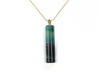 Rainbow fluorite crystal pendant from GemstoneGO featuring vibrant multi-colored fluorite gemstone on a silver chain.