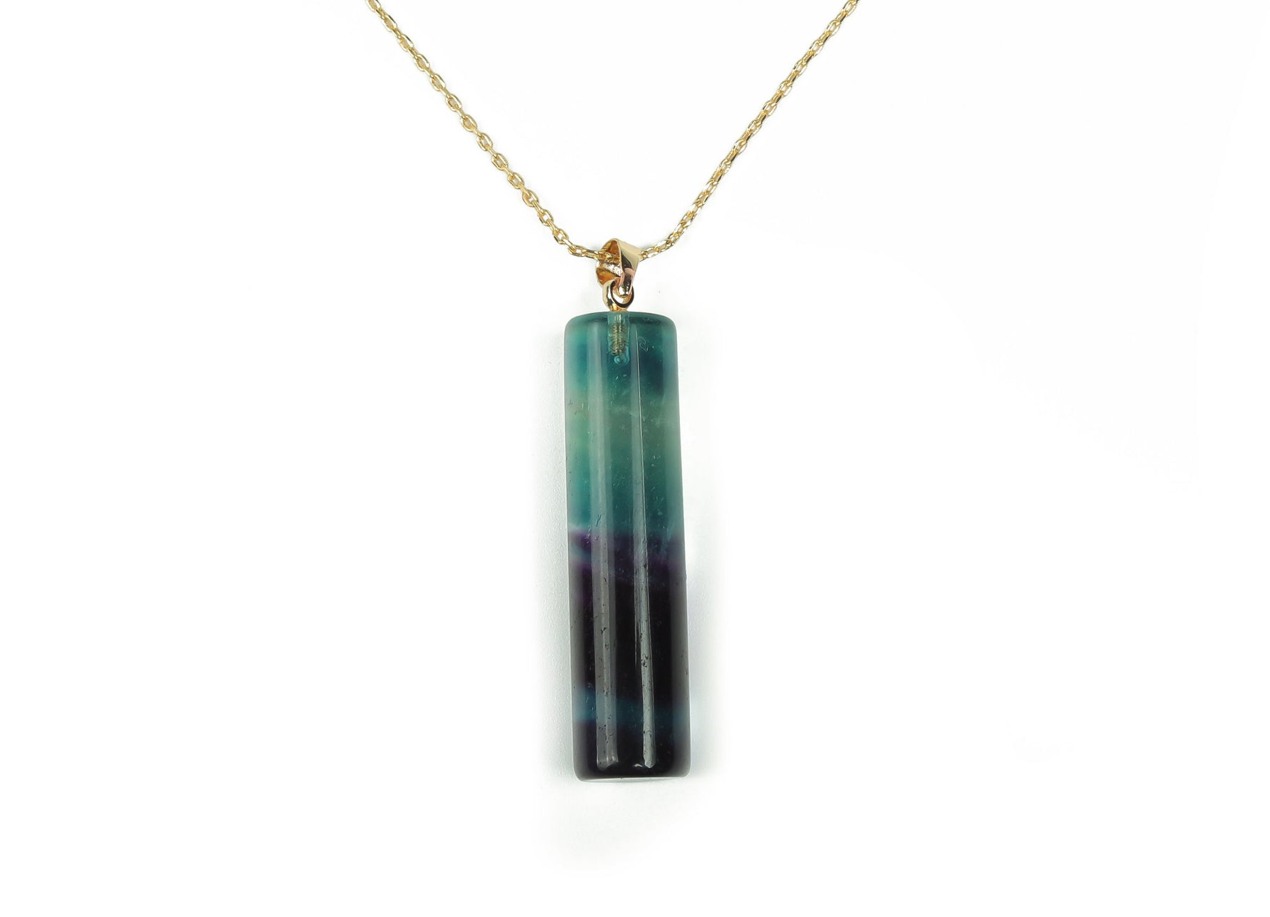 Rainbow fluorite crystal pendant from GemstoneGO featuring vibrant multi-colored fluorite gemstone on a silver chain.