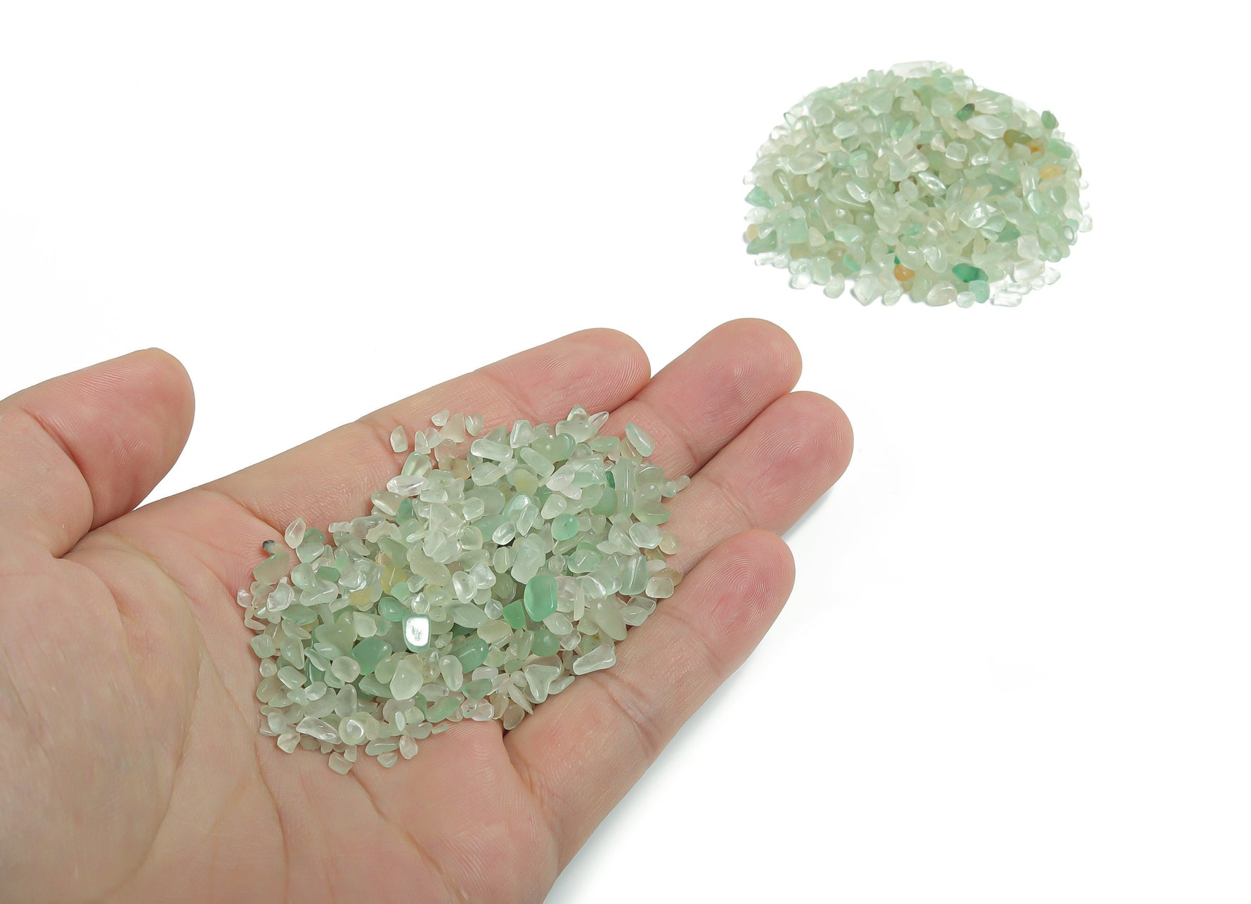 Aventurine crystal chips in various 2-6mm semi-tumbled stones, shown in bulk with green and shimmering inclusions.