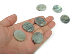 Labradorite flat gemstone slab with iridescent blue and green flashes, measuring 30x25x7 mm, from GemstoneGO.