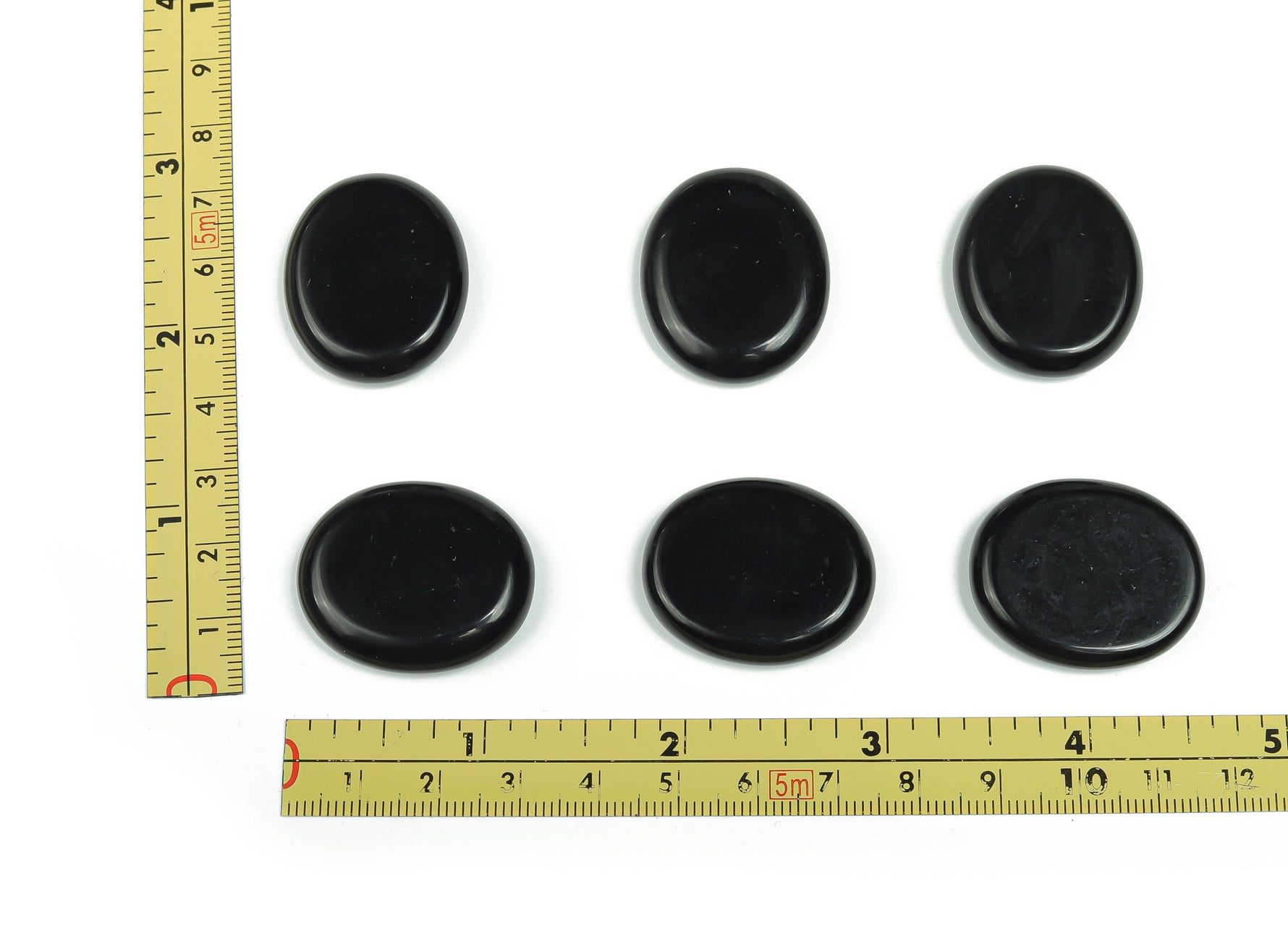 Obsidian flat gemstone slab measuring 30x25x7 cm from GemstoneGO, showcasing smooth, dark, and polished crystal surface.