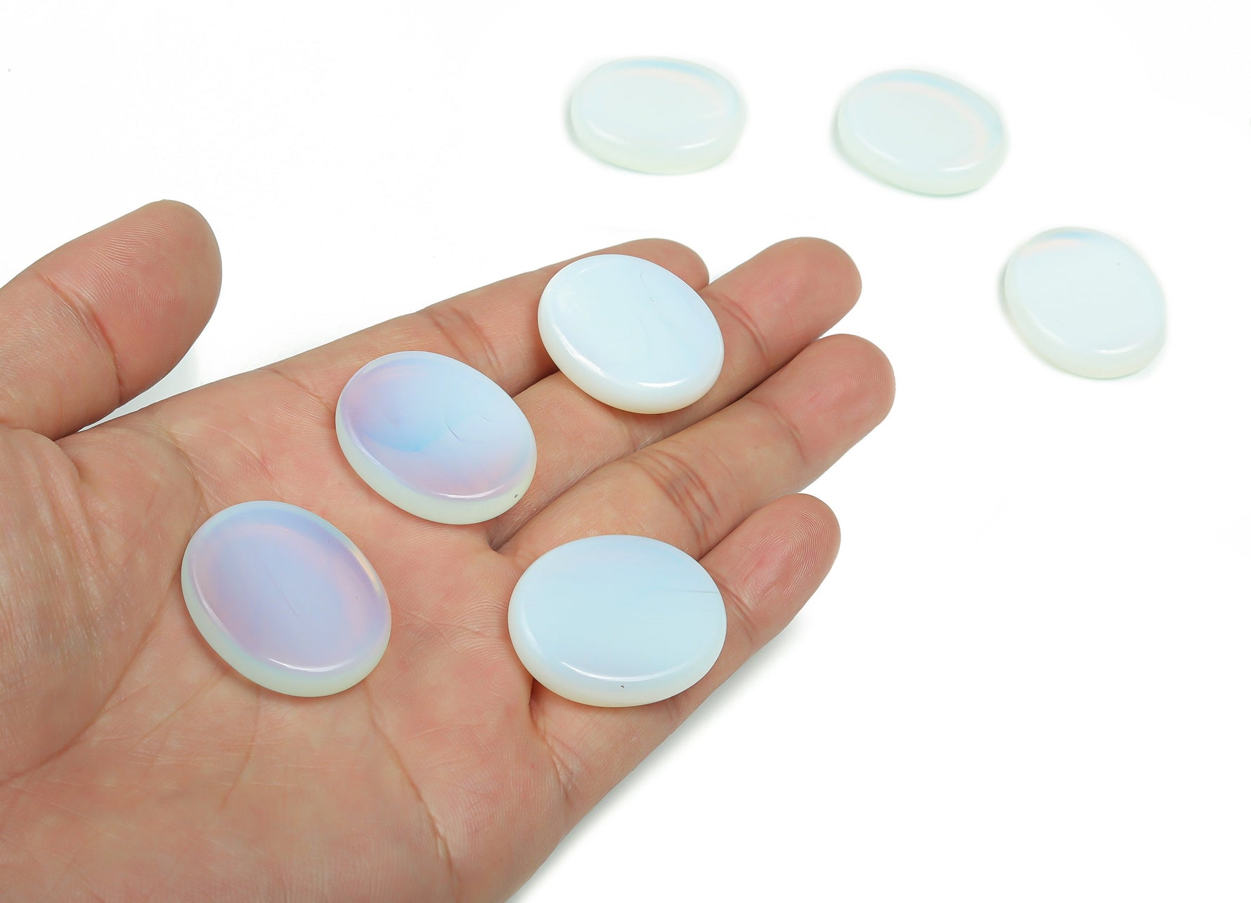 Opalite flat gemstone slab from GemstoneGO, measuring 30x25x7 cm, showcasing smooth, translucent crystal with iridescent glow.