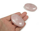 Rose quartz palm gemstone spa stone, 60x40mm, smooth polished healing crystal from GemstoneGO, used for relaxation and energy work.