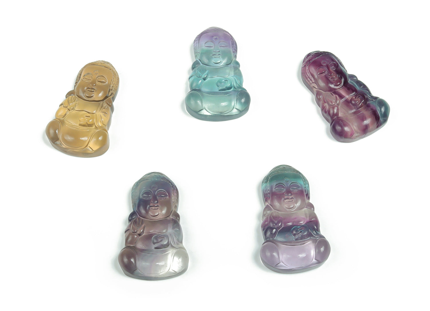 Fluorite Buddha carving gemstone from GemstoneGO showing a detailed, colorful Buddha figure with smooth finish and vibrant hues.