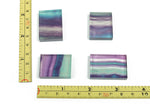 Bright green fluorite slice slab gemstone with natural banding and polished surface, showcasing vibrant colors and unique mineral patterns.