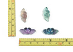 Fluorite wing heart gemstone carving by GemstoneGO showing a colorful, detailed heart-shaped pendant with wing accents.