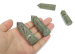 Dragon Blood Jasper obelisk tower crystal from GemstoneGO, showing a deep red and brown polished gemstone with natural patterns.