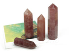 Strawberry Quartz obelisk crystal tower from GemstoneGO, showcasing a pink, polished gemstone with natural crystal formations.