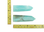 Amazonite obelisk tower crystal from GemstoneGO, showcasing a polished blue-green gemstone with natural mineral patterns.