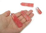 Cherry Quartz obelisk tower crystal from GemstoneGO, showcasing a vibrant red gemstone with a sleek, polished obelisk shape.