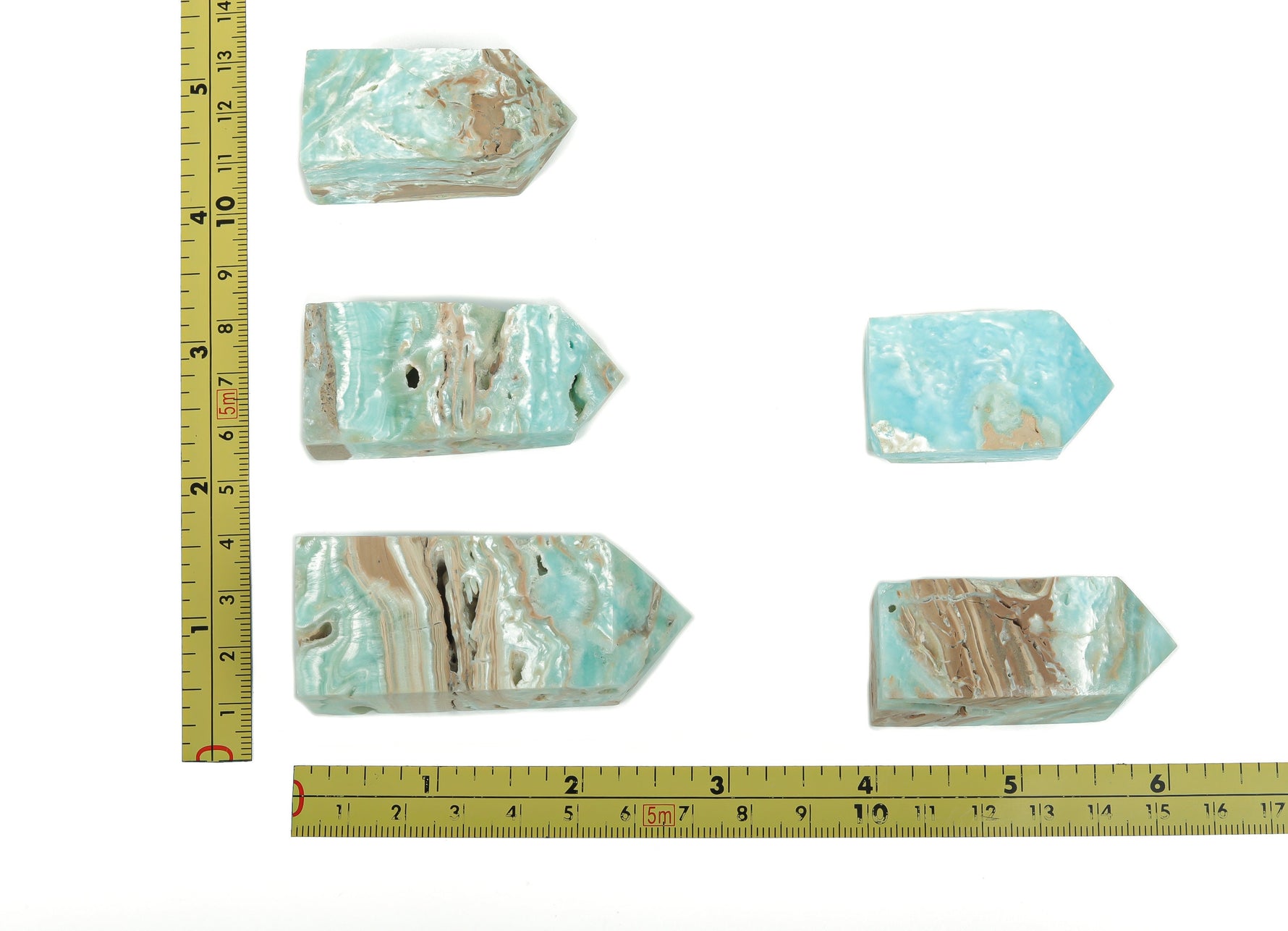 Blue Caribbean Calcite Druzy Obelisk Tower crystal from GemstoneGO, with vibrant blue and glittering druzy surface.
