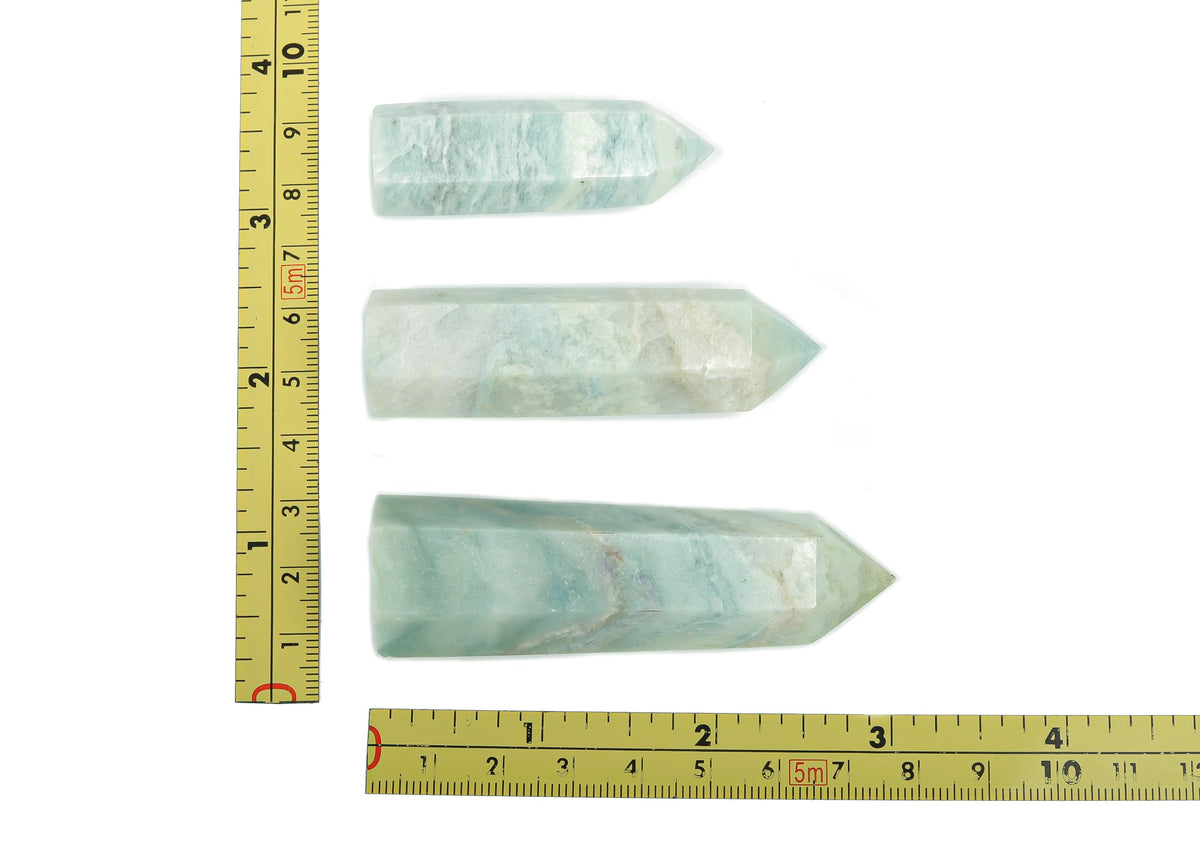 Sky blue Amazonite obelisk tower crystal from GemstoneGO, featuring smooth polished surface and natural stone details.