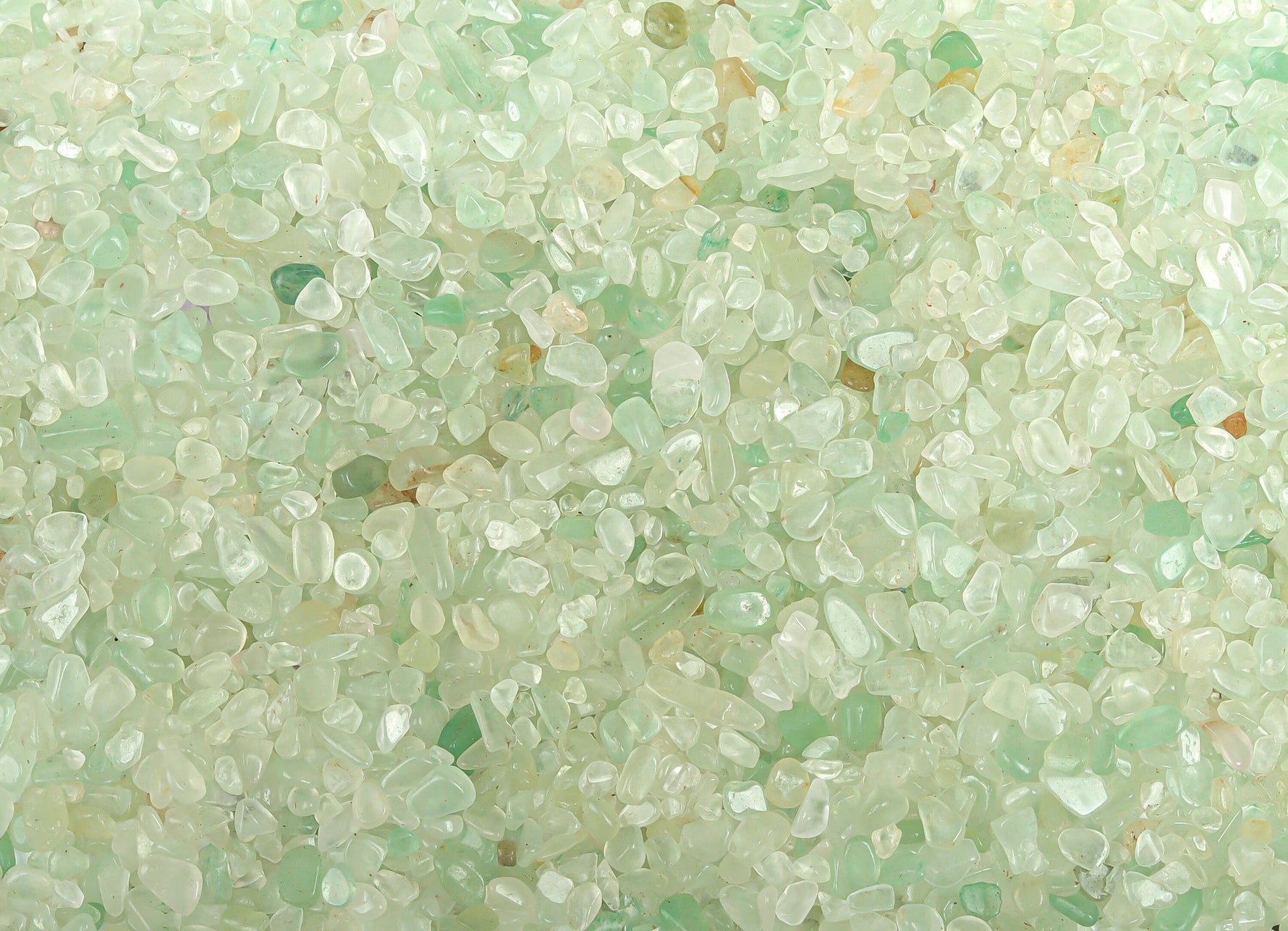 Semi-tumbled aventurine crystal chips in 2-6mm, natural green gemstone bulk stones from GemstoneGO.