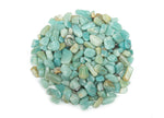 Caribbean Calcite crystal chips from GemstoneGO, semi-tumbled 5-8mm bulk stones with vibrant blue and green tones, natural mineral texture.
